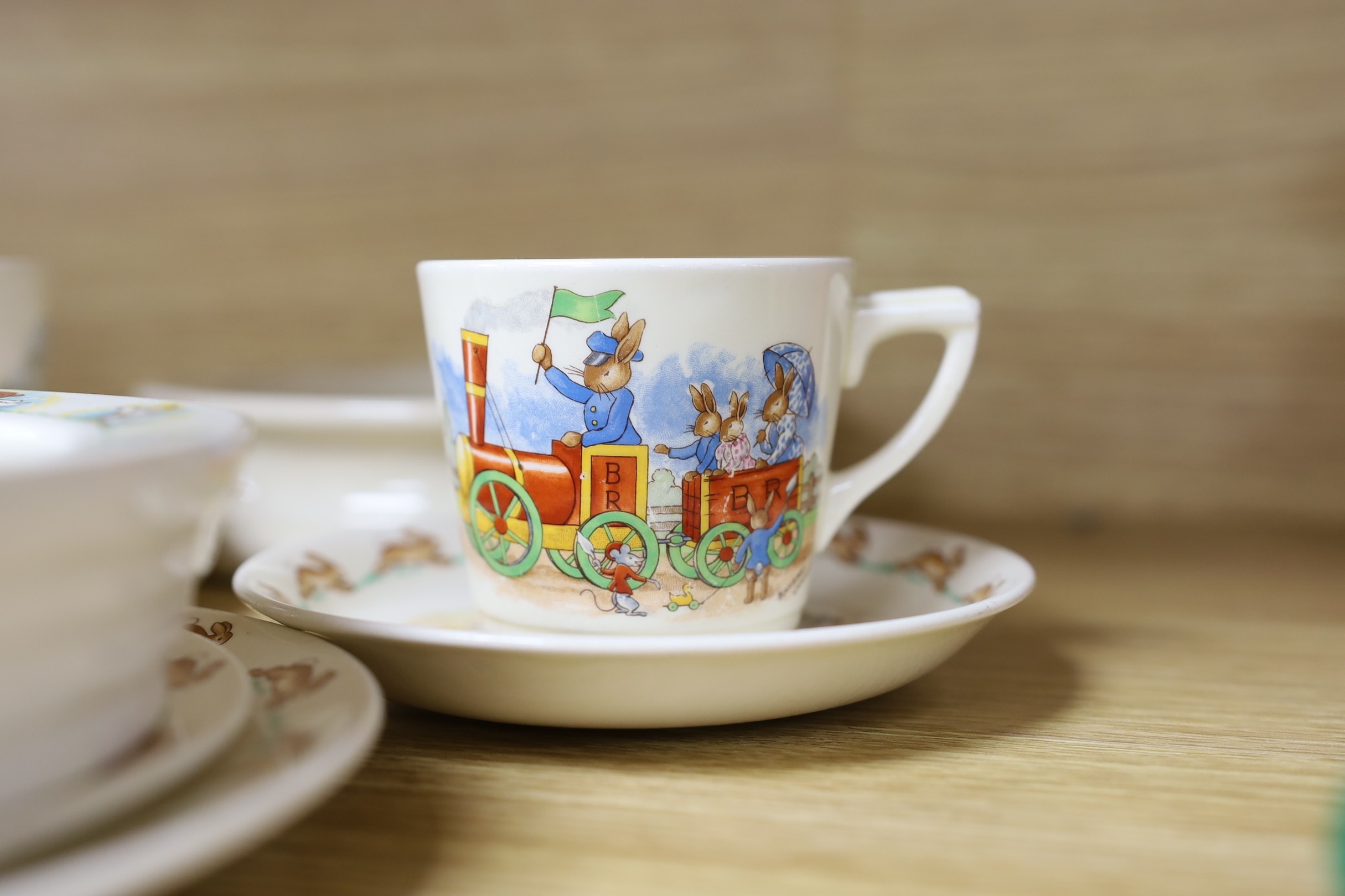 A selection of seven Royal Doulton Bunnykins tablewares, together with a Quack Quack Wade bowl